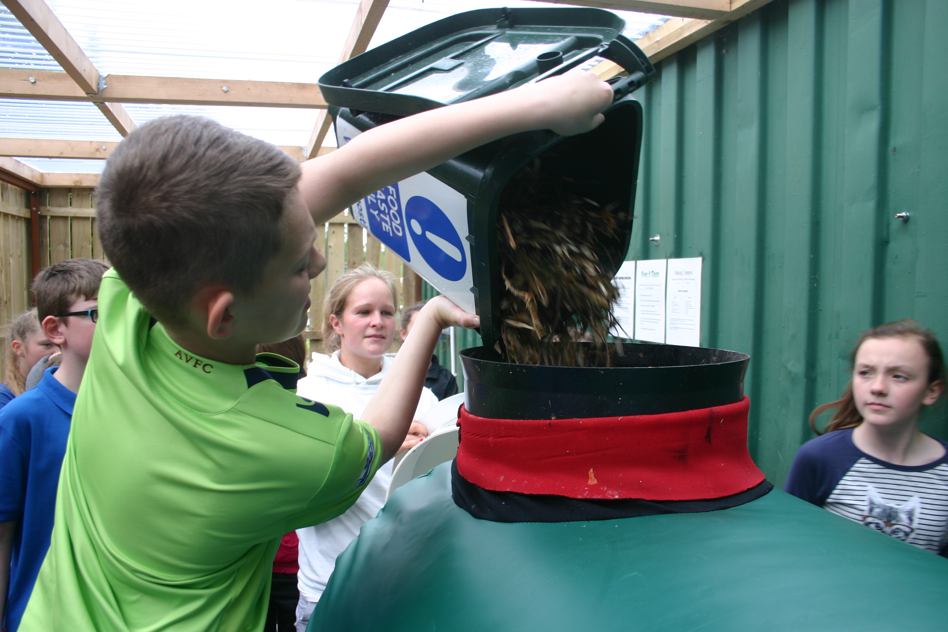 loading the food waste composter